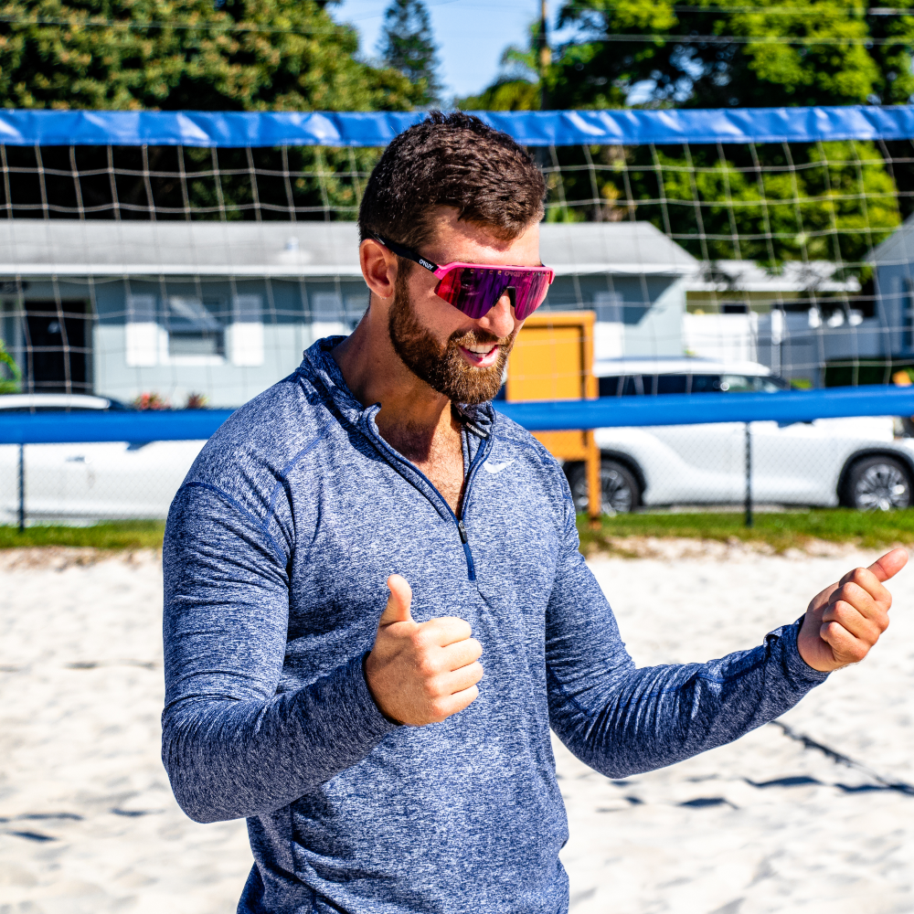 coach drew smittle coaching during a beginner beach volleyball class volleyball solutions