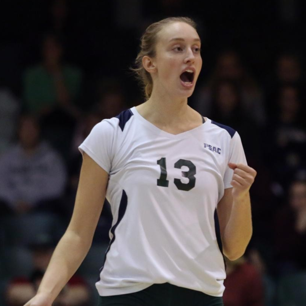 coach lauren kenny of volleyball solutions playing college volleyball at mercyhurst university